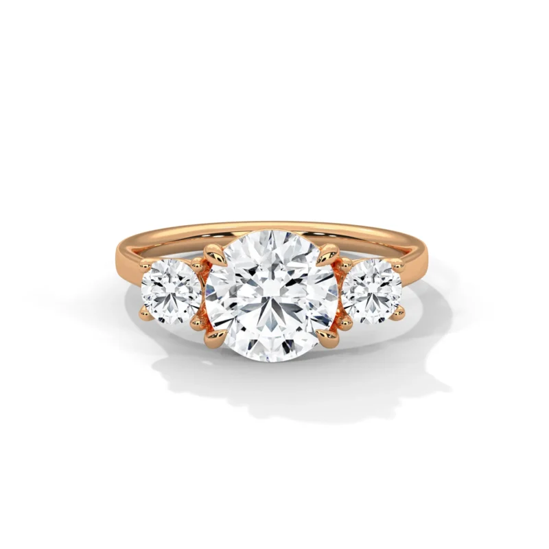 novafacet-classic-three-stone-round-ring-rose-front